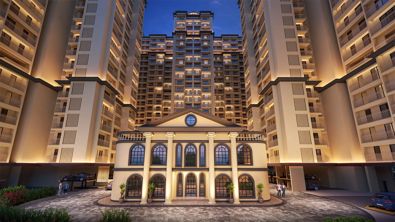 Mayfair Virar Gardens clubhouse and towers lit up at night